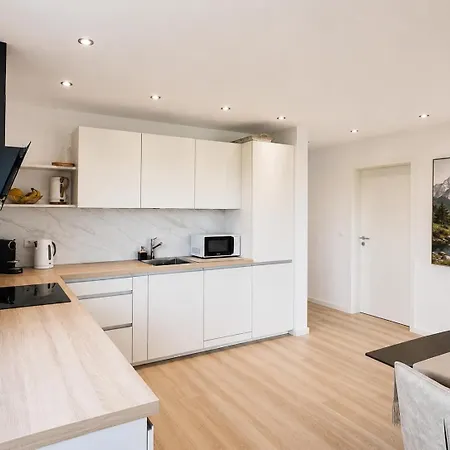 Moderne Design-apartments In Ruhiger Feldrandlage In Apartament